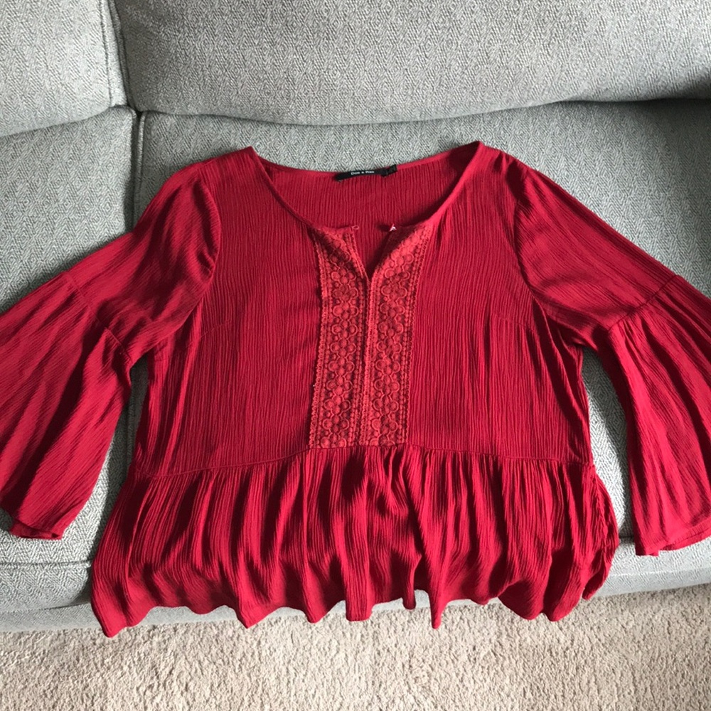 blouse with button at neckline